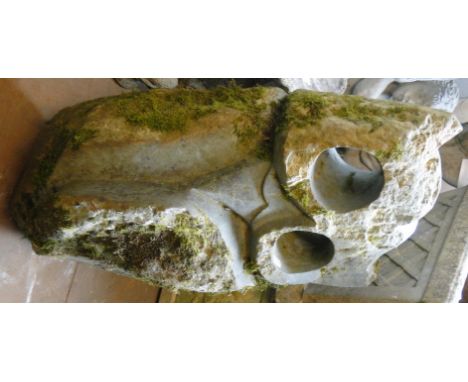 A carved green opal soapstone study of an owl, height 2'4".