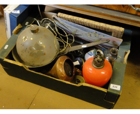 A suitcase, Art books, lamps, etc.
