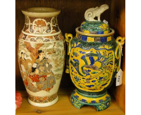 A Satsuma baluster vase and a Chinese jar and cover with dog of fo knop.