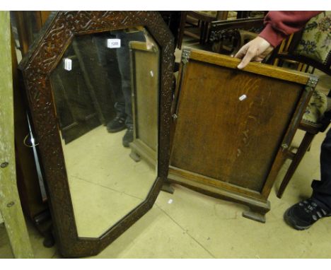 An oak carved octagonal mirror and an Art Deco oak firescreen.
