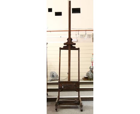 A large assemblage artist easel made from antique furniture, height approx 360cm 