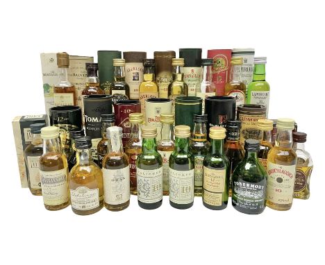 Twenty five miniature single malt Scotch whiskys, including Macallan 10 year old, Laphroaig 10 year old, Aberlour 10 year old
