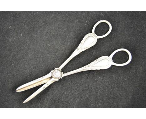 A pair of Victorian silver grape scissors with 'lily' pattern handles, London 1885, maker Edward Hutton - approx weight 101g/
