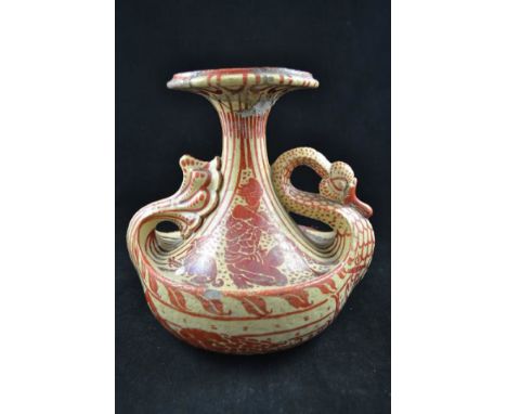 A late 19th century Maw & Co vase designed by Walter Crane, the body modelled as a swan, ruby lustre decoration depicting fig