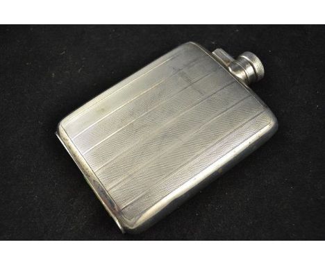 An early 20th century engine turned silver hip flask, inscribed to base J.O.E. Vandeleur (John Ormsby Evelyn Vandeleur was aw