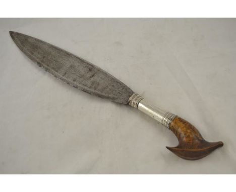 A Far Eastern (possibly Burmese) machete with white metal mounted wooden hilt - L54cm (overall)