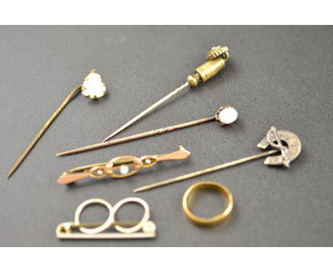 A 22ct gold ring - size F, a yellow metal stick pin set with oval opal, a stick pin set with heart shaped moonstone, a 9ct go