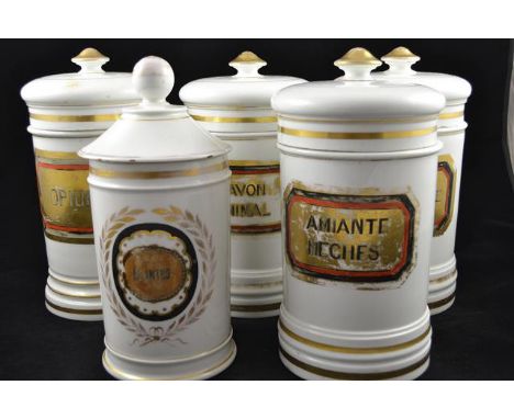 A set of four French ceramic chemist's jars with gilt labels, H25cm - Opium, Savant Animal, Amiante Meches, Colophane, togeth