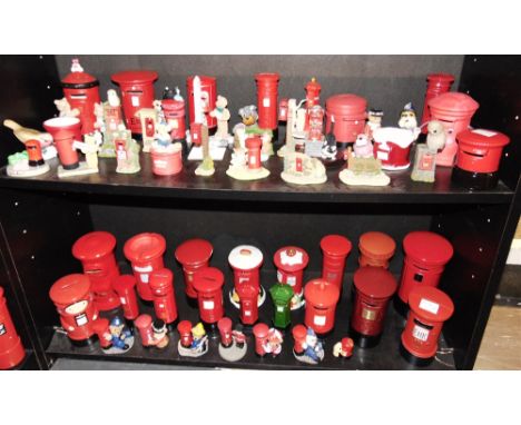 APPROXIMATELY FIFTY-TWO CERAMIC, RESIN & OTHER MODEL POST BOXES & ORNAMENTS  (two shelves).
