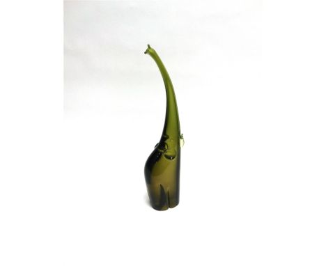 A LARGE GREEN GLASS SCULPTURE OF A STYLISED ELEPHANT  his trunk stretched upwards, unsigned polished base, 53.5cm high