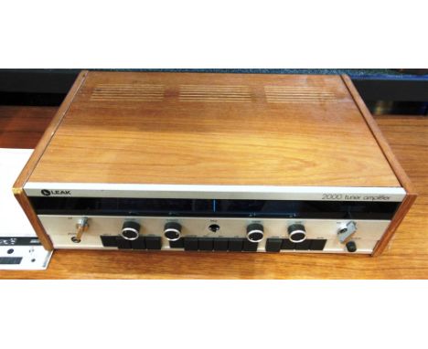 TWO LEAK HI-FI ITEMS:  a 2000 Tuner Amplifier and a 2001 Transcription Unit (record player), with instruction manuals