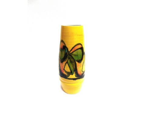 A LARGE POOLE POTTERY VASE  shape 85, abstract design on a yellow ground with decorators mark for Cynthia Bennett, 40cm high