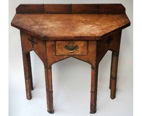 HALL/SIDE TABLE, early 20th century brass studded vintage brown leather covered of canted form with a frieze drawer, 92cm x 8