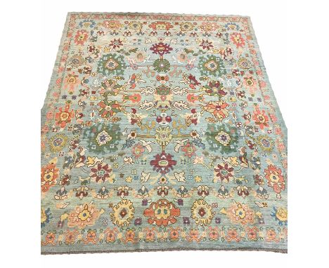 FINE OUSHAK CARPET, 418cm x 304cm, palmette and vine all over design on a duck egg blue field.