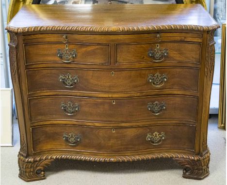 SERPENTINE CHEST, George III style mahogany with brushing slide above two short and three long drawers on carved bracket feet
