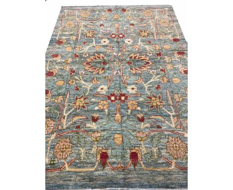 FINE BOULO OUSHAK CARPET, 290cm x 208cm, palmette and vine design on a duck egg blue field.