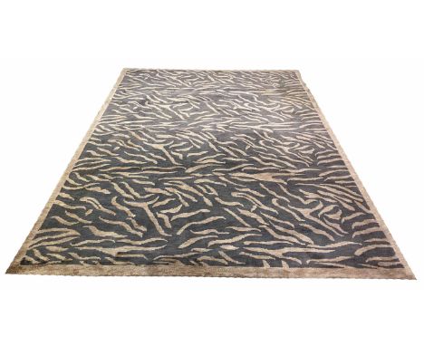 CONTEMPORARY TIBETAN TIGER DESIGN CARPET, 355cm x 250cm, hand knotted wool. (requires cleaning)