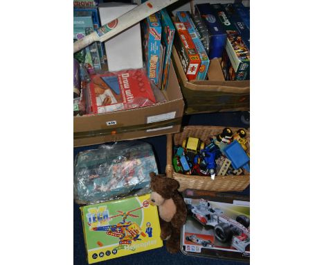 TWO BOXES AND ONE BASKET OF VINTAGE TOYS AND GAMES, to include a large play worn collection of mid-century toy cars, comprisi