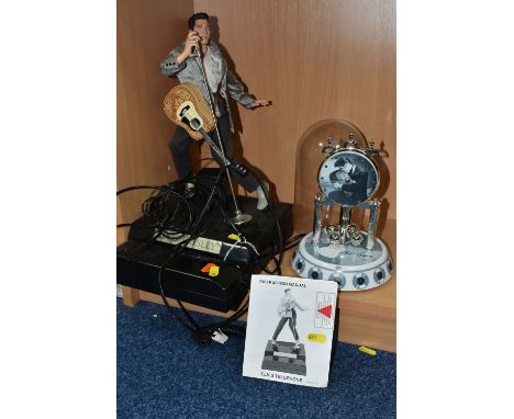 A BOXED TELEMANIA ELVIS TELEPHONE, comprising a singing and dancing telephone DM-221-002 with instruction manual (untested), 