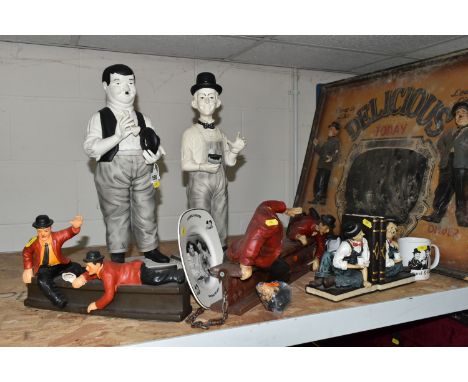 EIGHT PIECES OF LAUREL AND HARDY MEMORABILIA, including two Laurel and Hardy 50cm ceramic figures, two decorative ceramics on