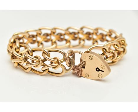 A 9CT GOLD FANCY LINK BRACELET, hollow double curb links, with rope twist detail, hallmarked 9ct Birmingham, fitted with a la