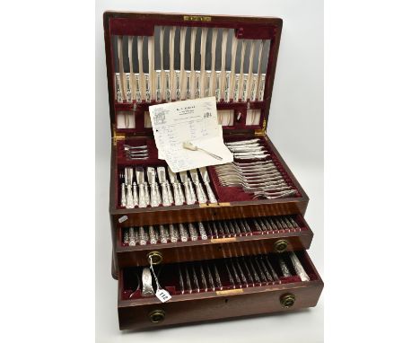 A LARGE CANTEEN OF SILVER CUTLERY, a mahogany canteen with hinged lid and two drawers, encasing an almost complete set of kin