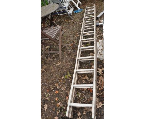 AN ALUMINIUM DOUBLE EXTENSION LADDER with 12 rungs to each 350cm section