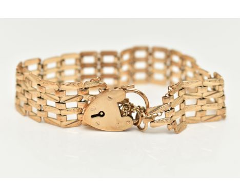 A 9CT GOLD GATE BRACELET, four bar gate bracelet, approximate width 14.9mm, scrolling and polished detail to the links, fitte