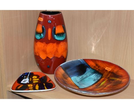 THREE PIECES OF POOLE POTTERY, comprising a Delphis four sided dish, a Living Glaze Gemstones charger, diameter 27cm, and a V