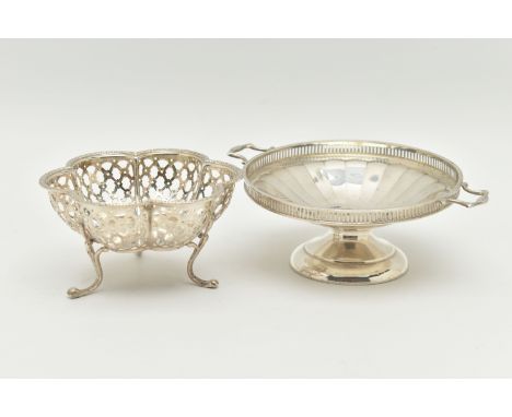 TWO SILVER BONBON DISHES, the first a scalloped form dish with pierced detail, raised on three feet, approximate width 95mm, 