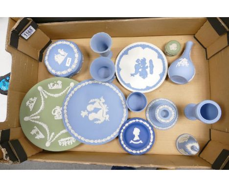 A collection of Wedgwood multi coloured jasperware to include: sage green plates, lidded box, light blue box, vases urns etc 