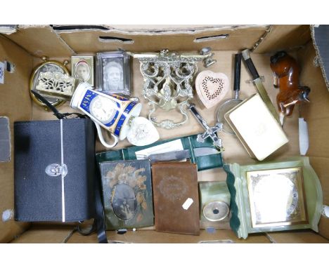 A mixed collection of items to include: Onyx mounted Garrard Mantle clock, Brass Letter Rack, picture frames, paper knifes et