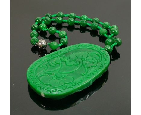 Carved Jade large oval pendant &amp; necklace: Carved with a wild horse, with bead necklace. 