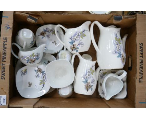A collection of Midwinter pottery to include:  Orchard Blossom patterned Tea &amp; Dinner Ware 