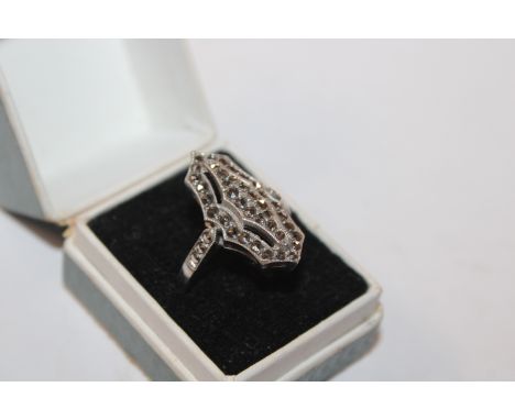 A Sterling silver and marcasite dress ring, ring size O/P