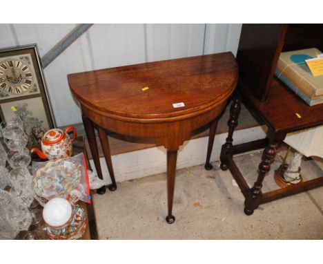 A 19th Century mahogany card table 
