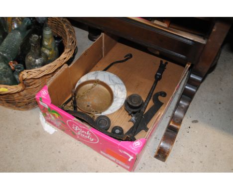 A box containing a set of balance scales 