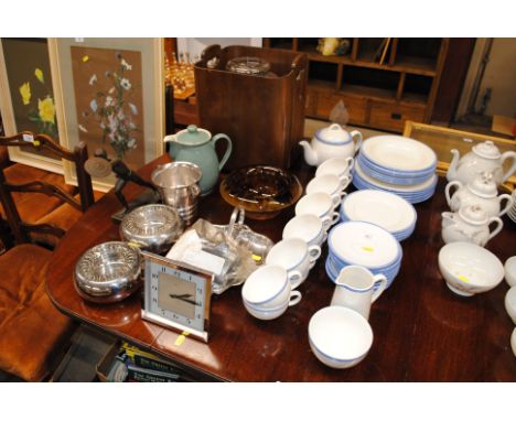 A quantity of white glazed dinnerware, tea ware, silver plated ware, mantel clock, spelter warrior etc.