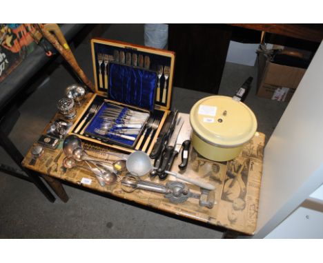 A canteen of fish knives and forks, a cased set of dessert knives and forks, various silver plated flatware, pressure cooker 