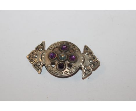 A Victorian Sterling silver amethyst set shield brooch 