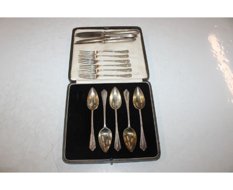 A part cased set of five silver grapefruit spoons, six silver handled forks, and five silver handled knives 