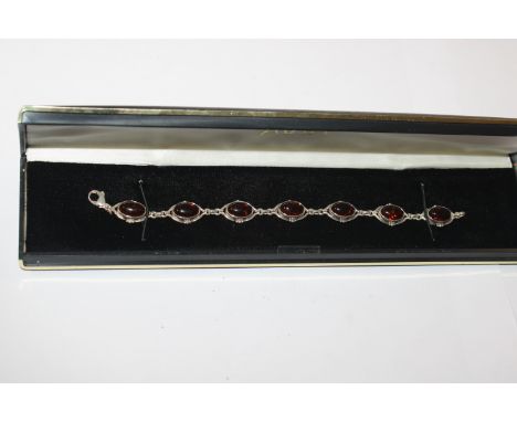 A Sterling silver and amber bracelet approx. 12.5gms 
