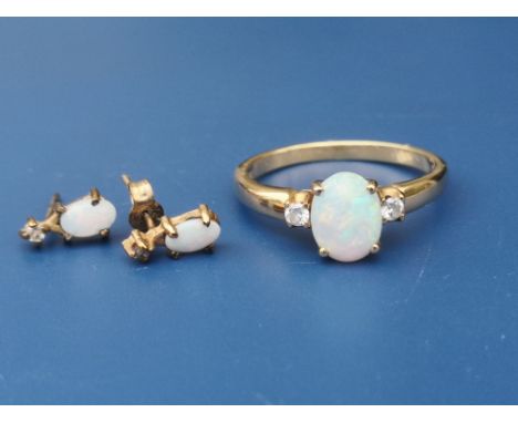 A modern opal &amp; diamond set 18ct gold ring, finger size P/Q, together with a small pair of 9ct gold opal &amp; diamond ea