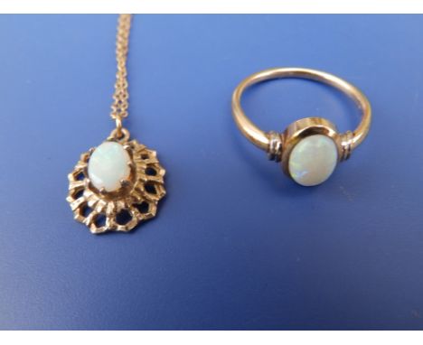 A 9ct opal ring and a pendant necklace. (2)