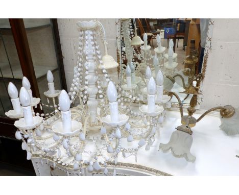 A Victorian style opaque white plastic 12 branch chandelier with beads and drops