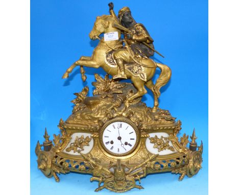 A 19th century French gilt metal mantel clock surmounted by a Middle Eastern figure on horseback, white enamel dial with orna