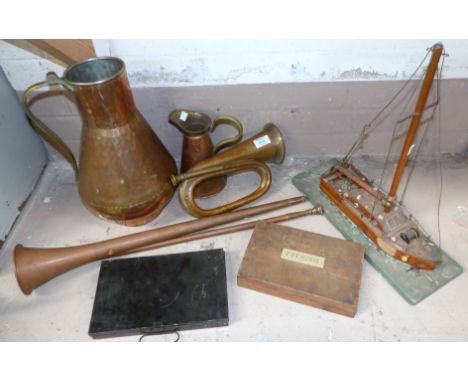 A WWI vintage bugle; a hunting horn; a large copper jug; a model ship; an artist's box; engraving tools; etc.
