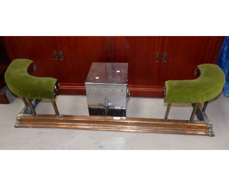 An anodised metal club fender with upholstered corner seats; a chromed Art Deco coal box