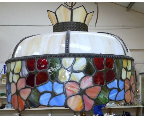 A large Tiffany style leaded and coloured glass light shade