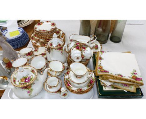 A Royal Albert "Old Country Roses" dinner and tea service, approx 42 pieces, with mats; etc.
